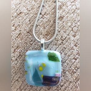 Fused glass pendant with silver chain.